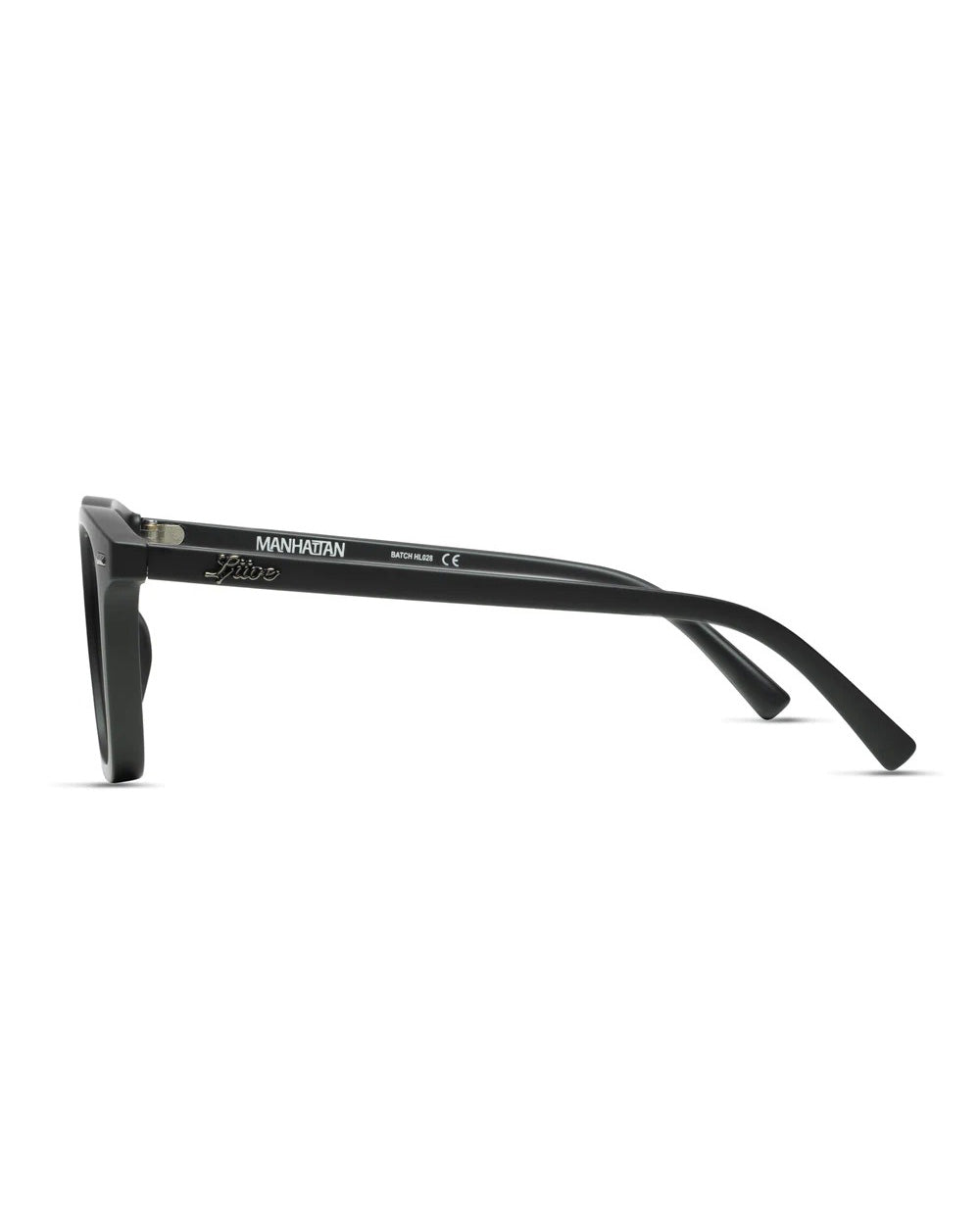 The Liive Manhattan Sunglasses feature a side view of black frames crafted from durable polycarbonate with straight arms. The inner arm displays "MANHATTAN" and markings in white text. With UV protection and a subtle nose bridge curve, they effortlessly blend style and functionality.