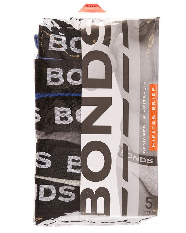 A packaged set of Bonds 5PK Elastic Waist Briefs, containing 5 pieces. The clear packaging prominently displays the "BONDS" logo in large, bold letters on the front. The elastic waist briefs inside come in various colors with the "BONDS" brand visible. The size marked is M.