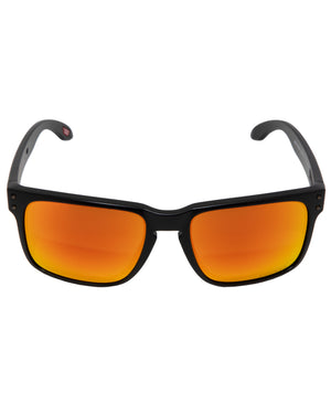 The Oakley Holbrook sunglasses have sleek black frames and vibrant orange Prizm lenses, offering stylish design and excellent UV protection.