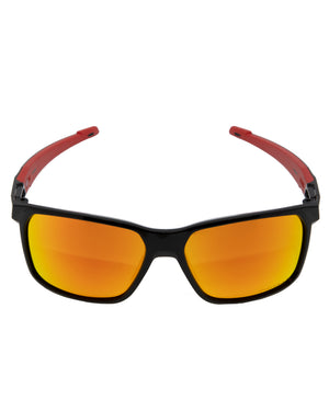 The Oakley Portal X Polarized sunglasses boast sleek black frames and vibrant orange-tinted Prizm lenses, complemented by red temples that add a contrasting pop of color to their sporty design.