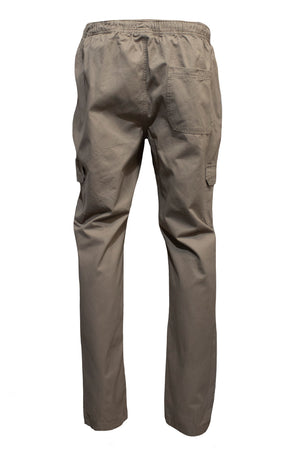 The Pilgrim Cargo Twill Beach Pant in khaki showcases its back view, highlighting an elastic waistband. Designed with multiple pockets, there's one near the waist and two at the thighs, made from lightweight material for a casual vibe.