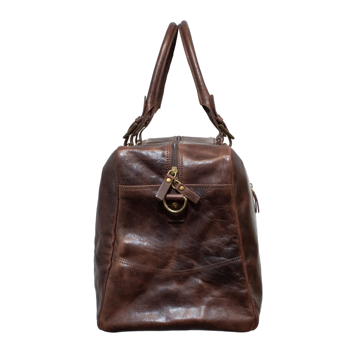 Side view of the Pierre Cardin Rustic Leather Overnight Bag in vintage brown genuine leather with a top handle, zipper closure, and a small padlock attached to the zipper pull. The bag features a textured surface, visible stitching, and a small exterior pocket. The leather straps make it perfect for an overnight stay.