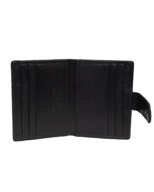 The Pierre Cardin Wallet is crafted from genuine black leather and features multiple card slots on each side, along with a clasp on the right. The interior is plain and uncluttered, providing a sleek look with added RFID protection.