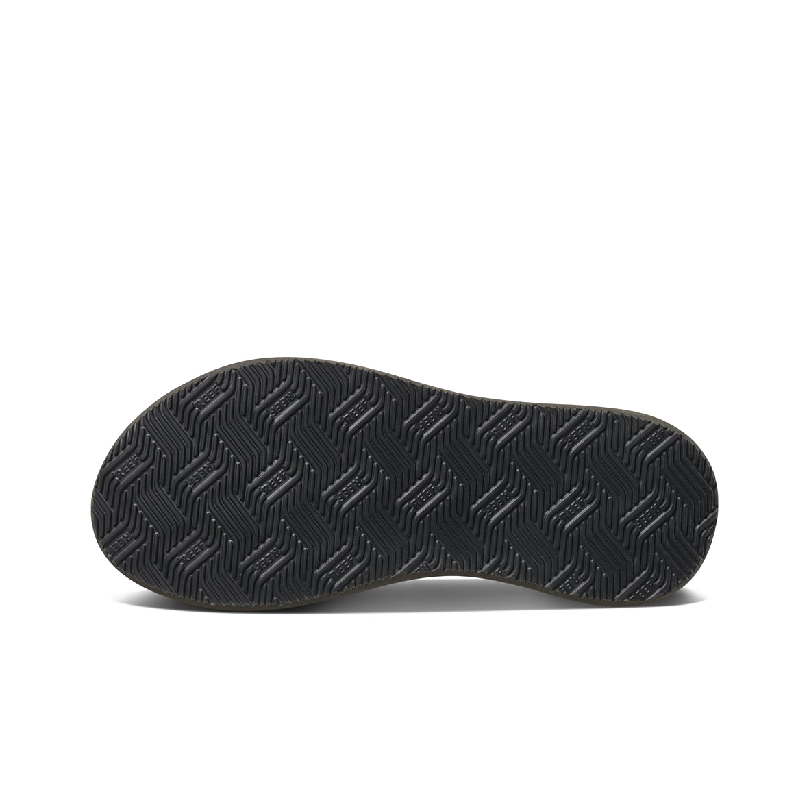 The image shows the sole of the REEF Phantom II shoe with a herringbone tread pattern. The black sole, presented on a white background, displays the intricate texture and design commonly used for grip and durability, featuring enhanced arch support for added comfort.