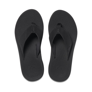 The REEF Phantom II flip-flops come in black, featuring textured soles and straps with enhanced arch support for added comfort. The brand logo is visible on the insole near the heels, and a small logo is embossed on the straps. These supportive thongs have a simple, minimalist design, making them perfect for water-friendly adventures.