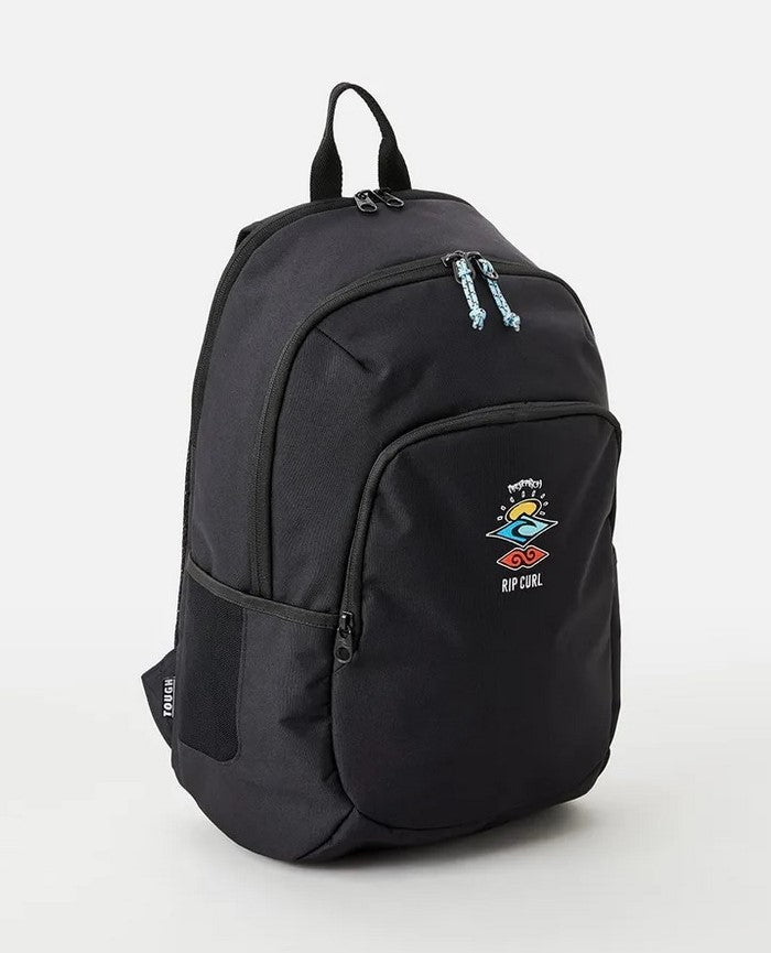 The Rip Curl Ozone 30L Icons Eco Backpack is made from recycled plastic and includes multiple zipped compartments, a dedicated laptop section, colorful abstract logo on the front pocket, top handle, and adjustable shoulder straps. Its simple, modern design makes it perfect for everyday use.