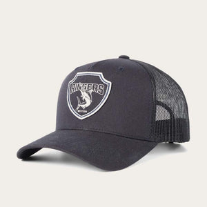 The Ringers Western Marlin Trucker hat is black with a mesh back and curved brim, featuring a shield logo with "Ringers," a bull rider illustration, and "Western" beneath it on the front. It has an adjustable strap for a perfect fit on any adventure.