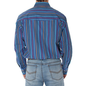 A person is shown from the back wearing a Ringers Western Wyoming Shirt, a blue long-sleeve semi-fitted shirt with vertical multicolored stripes, made from 100% cotton. The shirt is tucked into light blue denim jeans, and the person's medium-length hair completes the casual look.