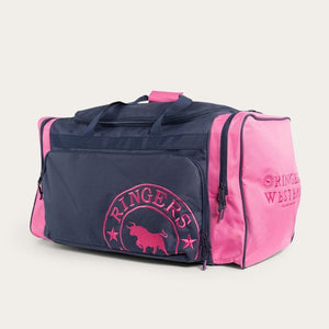 The Ringers Western Rider Sports Bag is a stylish duffel bag featuring dark blue and pink sections. It showcases the "Ringers Western" logos and text on the front pocket and side panels, along with a bull silhouette. The bag also includes handles and a shoulder strap for versatile carrying options.