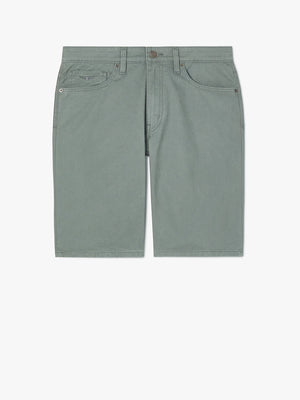 Light green RM Williams Nicholson Shorts lie against a white background, featuring a classic five-pocket design and belt loops, crafted from comfortable cotton.