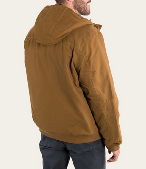 A man in a Ringers Western Kalgoorlie Long Canvas Jacket, brown with a hood, crafted from cotton canvas, is shown from the back, paired with dark pants against a plain background.