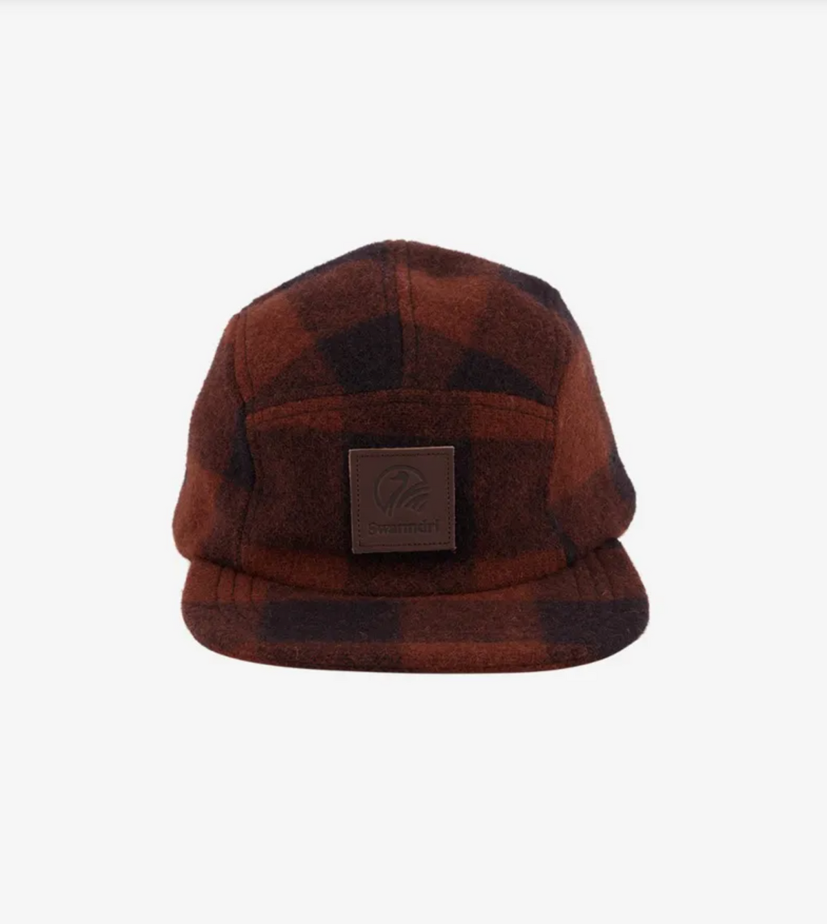 The Swanndri Wentworth Valley Cap, made from brown and black plaid Swanndri wool, includes a front logo on a black patch. It's elegantly showcased against a plain white background.