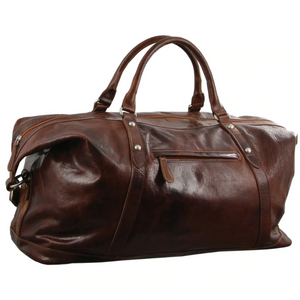 The Pierre Cardin Leather Travel Bag is a spacious brown leather travel accessory with dual handles, an adjustable shoulder strap, zippered main compartment, and exterior pocket. It boasts a glossy finish with visible stitching and metal rivet accents for timeless elegance.