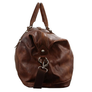 Side view of the Pierre Cardin Leather Travel Bag in brown leather with top handles and an adjustable shoulder strap. Features include metal hardware and a slightly worn texture, enhancing its vintage style.