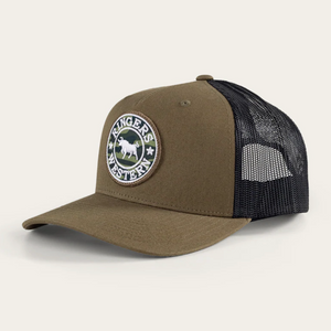 The Ringers Western Chase Trucker Cap features a brown front, black mesh back, and circular patch with an animal silhouette and "Ringers Western." It has an adjustable strap and is set at a slight angle on a plain background.