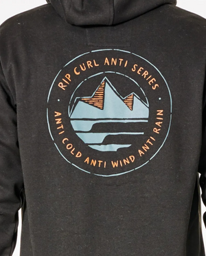 The Rip Curl Anti Series Journey Hood showcases a back view with a black hoodie and circular logo of stylized mountains and waves. The text "Rip Curl Anti Series, Anti Cold, Anti Wind, Anti Rain" highlights its winter design with durable water-resistant fabric for ultimate protection.