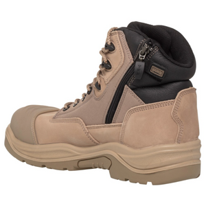 The Magnum Trademaster Lite Zip Sided Waterproof Safety Boot MTM150 is a tan and black work boot featuring a side zipper, composite steel toe cap, durable stitching, and a rugged slip-resistant sole suitable for heavy-duty use.