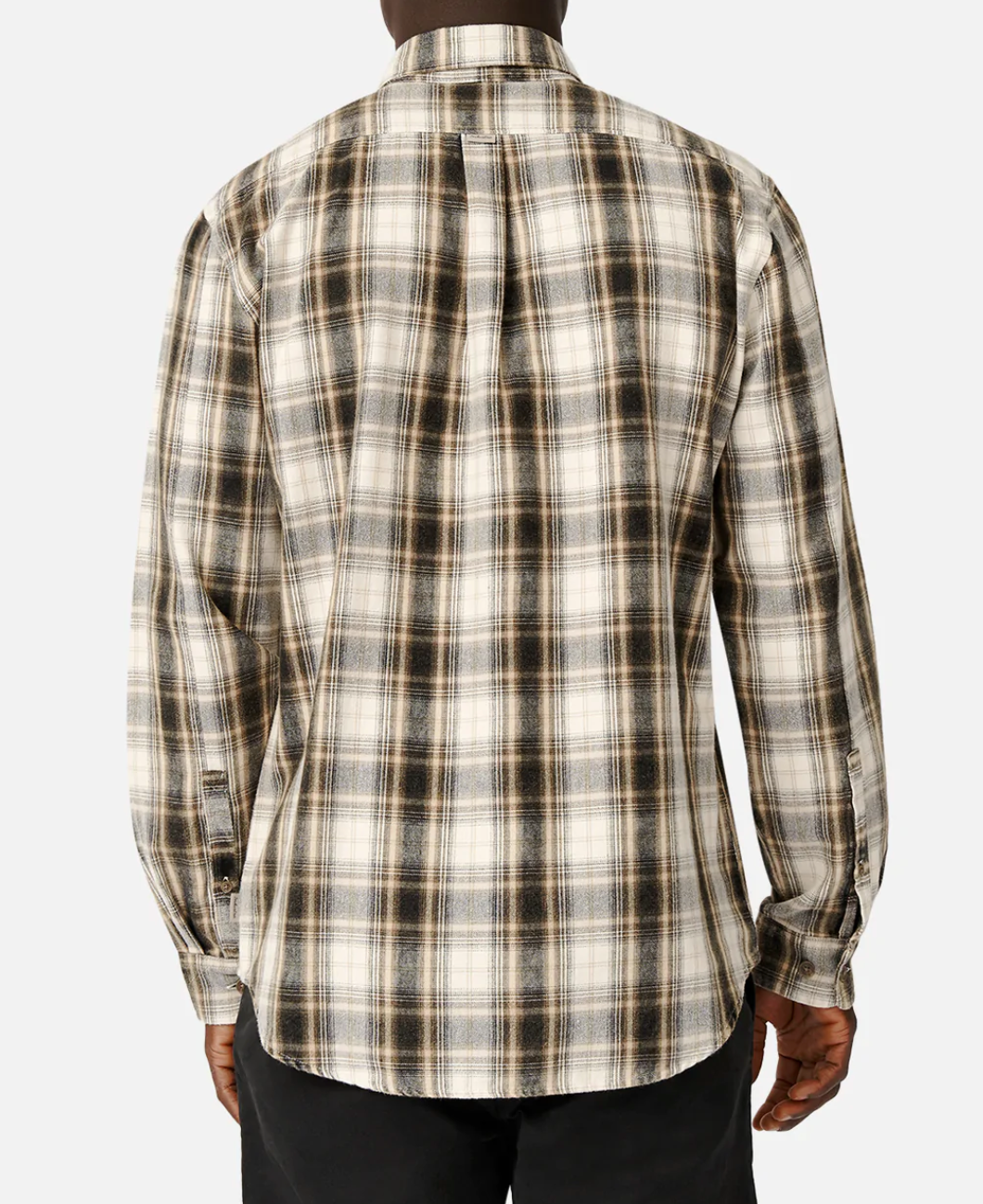An individual is wearing the Industrie The Cedar Oaks Shirt, a long-sleeve, plaid flannel in shades of cream, brown, and black. Made of 100% cotton, the shirt is untucked to exude a comfortable and relaxed vibe. The person, also dressed in dark pants, stands with their back to the camera.