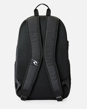 The Rip Curl Ozone 30L Radar Backpack is black, shown from the back with two padded shoulder straps (left strap has a small white logo), a top handle, mesh back panel for ventilation, and a dedicated laptop section.