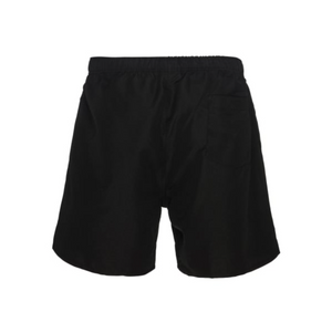 The image displays the back of Canterbury Tactic Shorts in black, featuring an elastic waistband and a right-side patch pocket. Made from smooth, lightweight polyester, these shorts provide comfort and style.