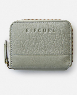 The Rip Curl Small Leather Wallet in textured gray leather features an embossed brand name on the front. This minimalist design includes a zipper closure and an ID window for convenience.
