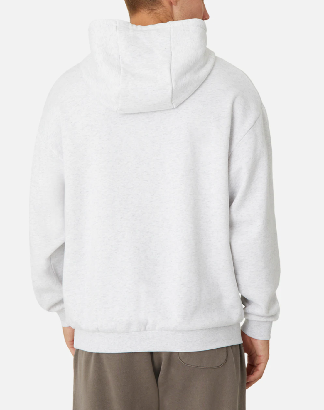 A person is shown from the back wearing a plain light gray oversized hoodie with a hood and long sleeves, named Industrie The Del Sur Hoodie, paired with dark gray pants. An Industrie embroidered logo enhances the look against a plain white background.