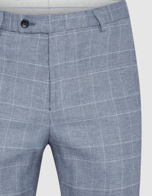 Close-up of the Connor Sorrento Slim Dress Pant in light blue with a subtle white plaid pattern, featuring belt loops and a single button closure at the waistband.