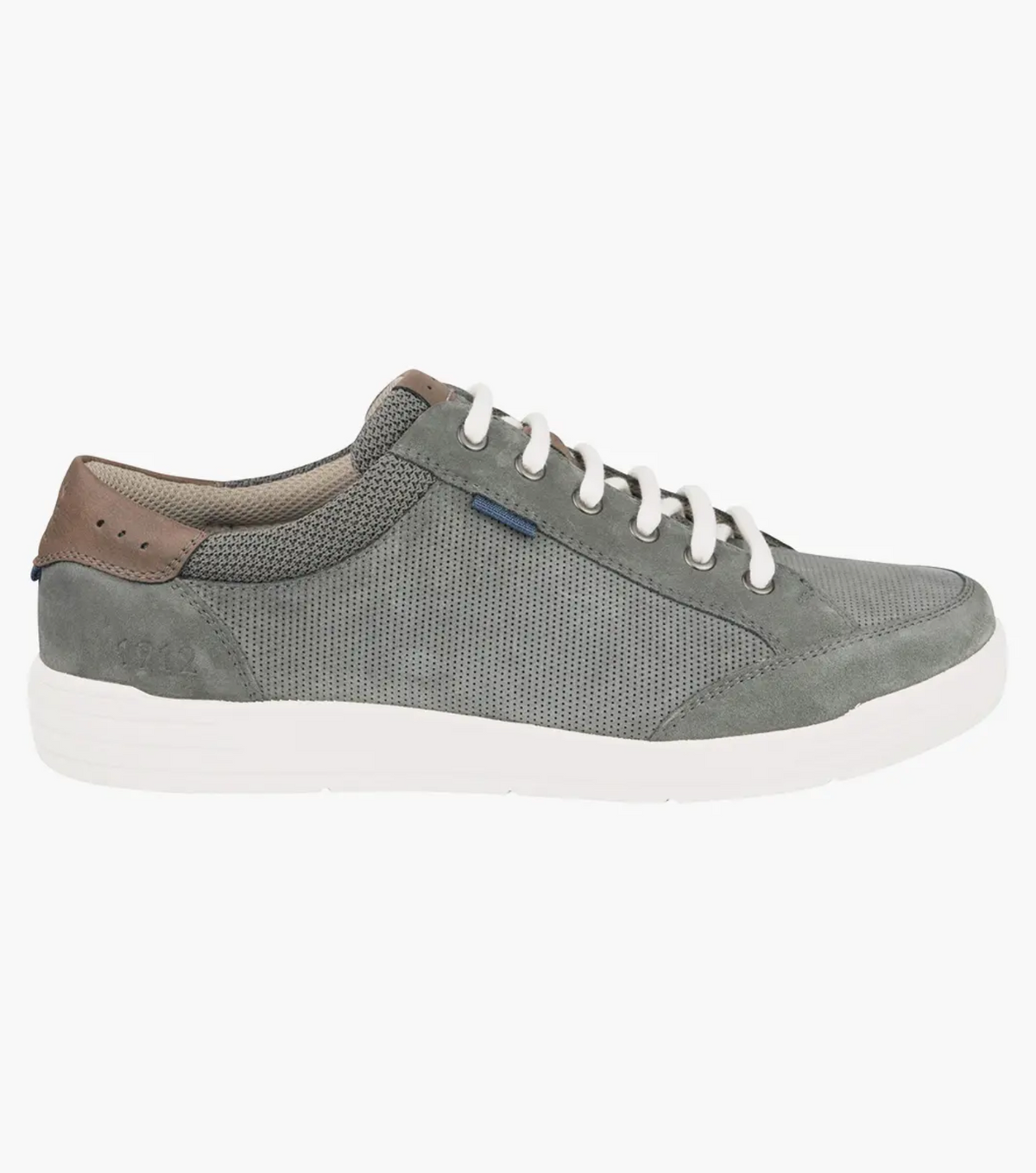 Introducing the Florsheim City Walk Lace Sneaker: a casual grey sneaker with white laces, a white sole, brown heel accent, small blue tag, and perforated suede leather details. Designed with textured breathable mesh and a cushioned footbed for ultimate comfort.