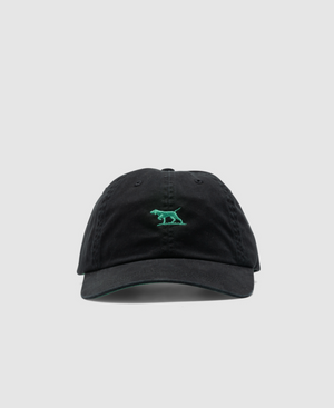 The Rodd & Gunn Gunn Cap is a black baseball cap made from durable cotton twill with a small green embroidered animal logo on the front. It features a curved brim and is presented against a plain white background, highlighting Rodd & Gunn's dedication to style and quality.