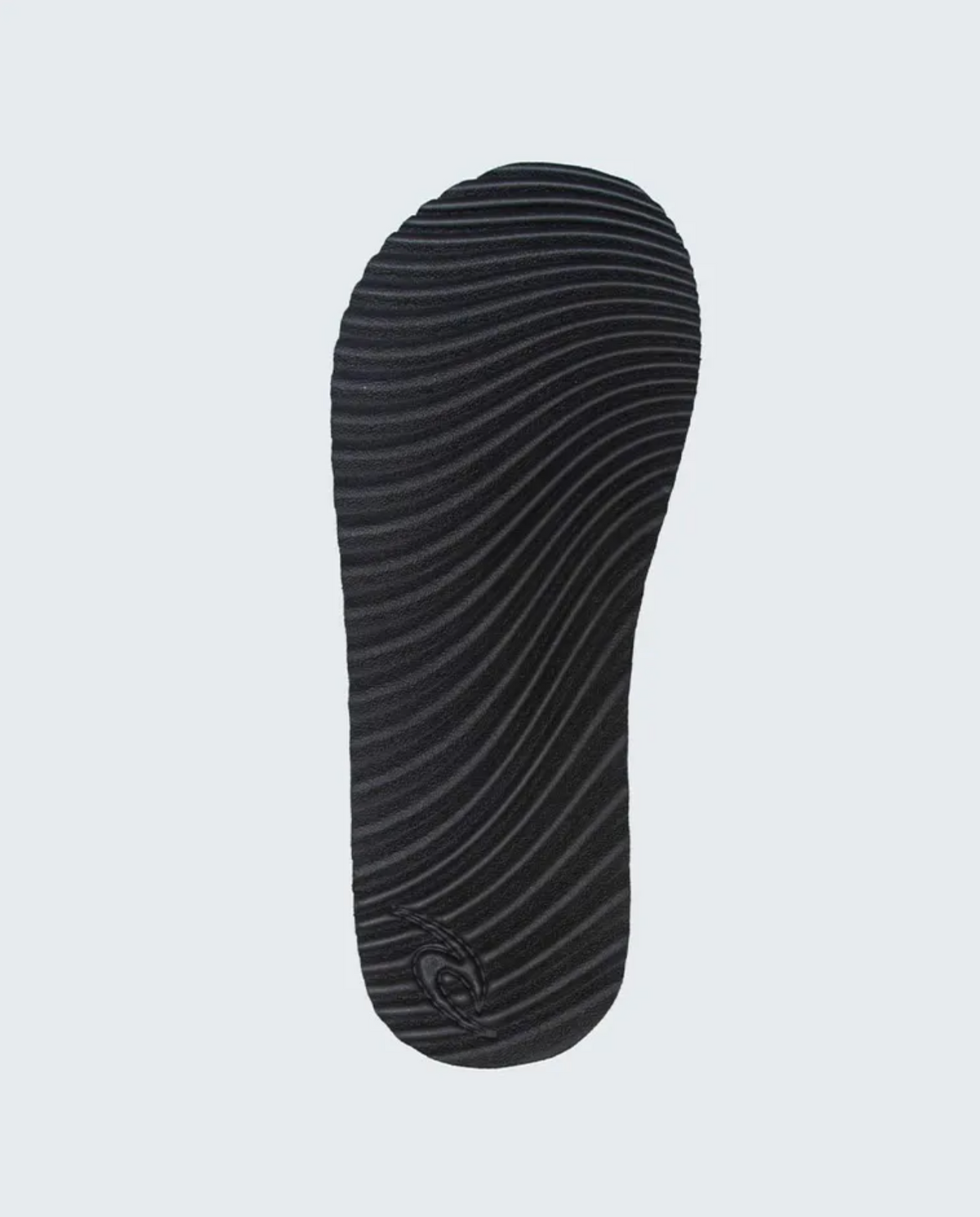 The Rip Curl D-Bah Sandle boasts a black sole made from recycled EVA, featuring a wavy texture and an embossed logo near the heel on a light gray background.