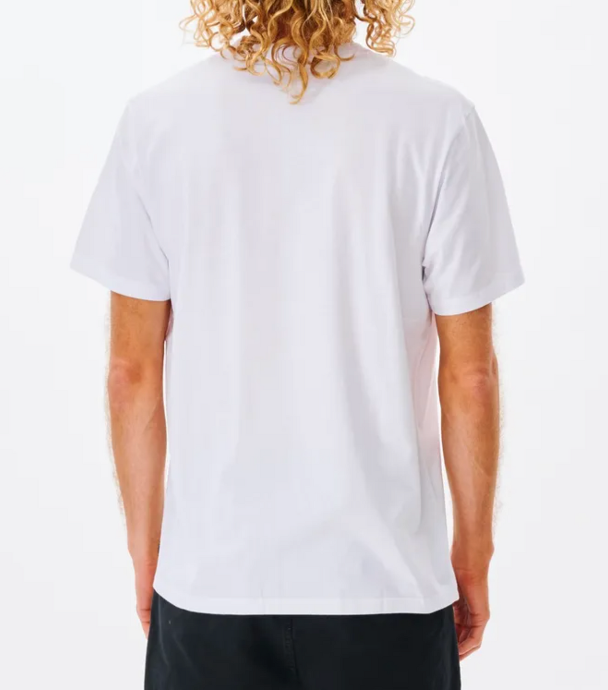 A person with curly blonde hair is shown from the back, wearing a Rip Curl Corp Icon Tee in white and black pants, set against a white background.