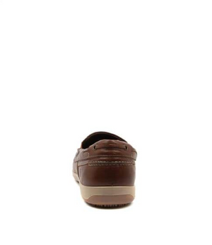 Rear view of the Colorado Broad Slip On Boat Shoe, a brown leather loafer with visible stitching and a tan rubber sole. Designed for slip resistance, it combines a boat shoe style against a white background.