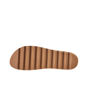 The REEF Cushion Bloom Hi features a light brown, textured sole with horizontal ridges similar to a Reef sandal bottom, displayed on a plain white background. Its cushion bounce midsole offers the perfect blend of style and support.