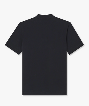 The RM Williams Rod Polo is displayed from the back against a white background. This plain black, short-sleeved polo shirt features a simple design made from soft cotton pique, with no visible branding or patterns.