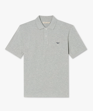 The RM Williams Rod Polo is a light grey, short-sleeved cotton shirt with a collar and three buttons along the neckline. It features R.M.Williams' signature Longhorn embroidery on the left chest, adding a touch of rugged elegance.
