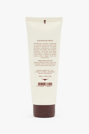 The RM Williams Leather Conditioner comes in a tube with an off-white surface and a brown cap. The packaging includes text detailing the product description and directions for use. Made with Australian ingredients, this conditioner is perfect for maintaining leather boots and other leather goods.