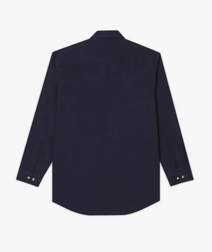 The RM Williams Angus Shirt, a relaxed-fit, long-sleeved work shirt in dark navy blue with a pointed collar and buttoned cuffs, is displayed flat from the back on a white background.