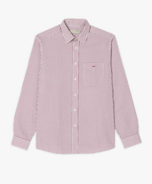 The RM Williams Collins Shirt is a classic fitting, long-sleeved shirt with a red and white gingham pattern. Made from twill cotton, it features a collar, a left chest pocket, and buttoned cuffs.