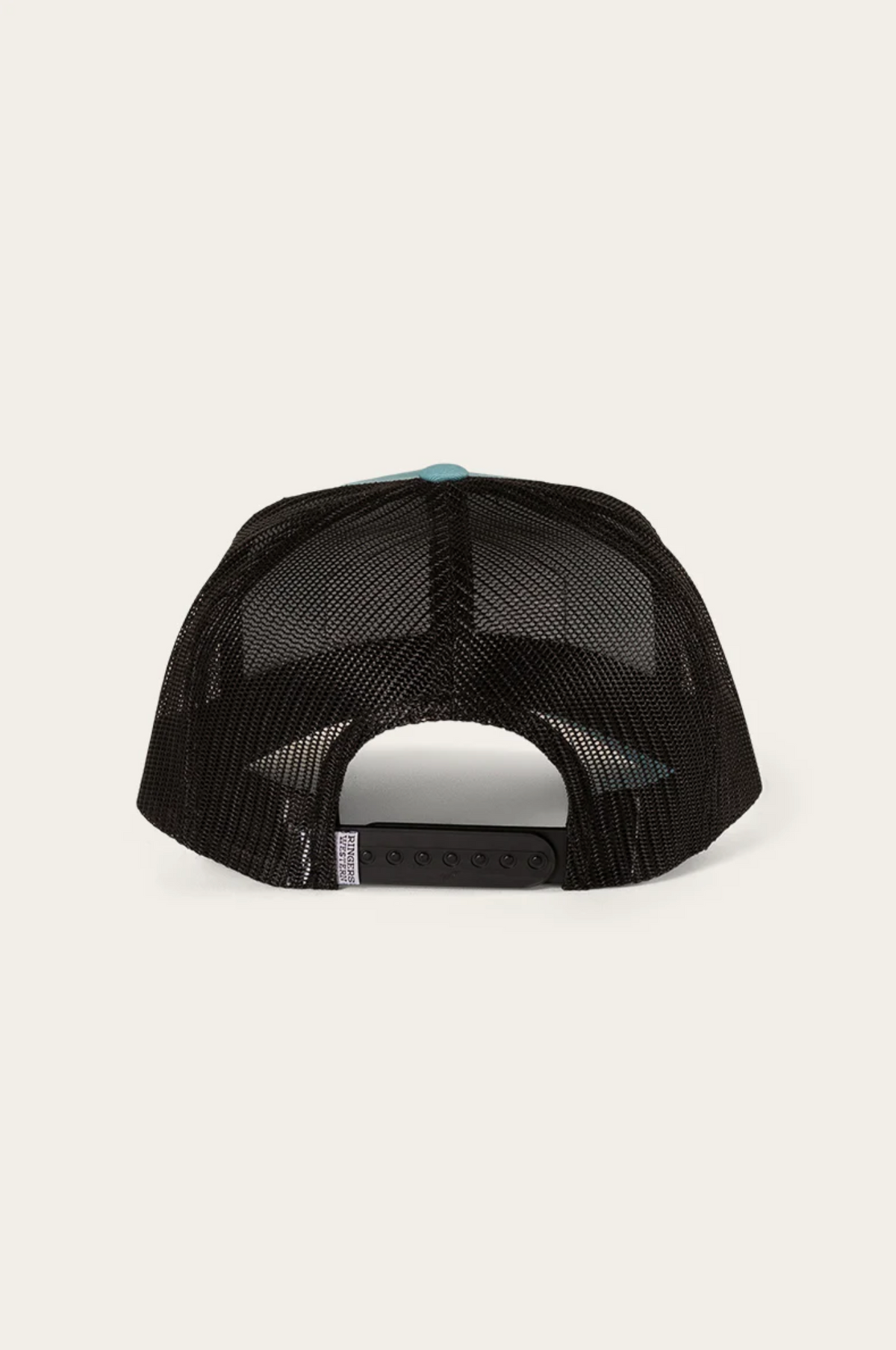 The Ringers Western Scotty Trucker Cap has a classic black mesh design, durable cotton twill front, and adjustable snapback closure for a perfect fit, all showcased from the back against a plain background.