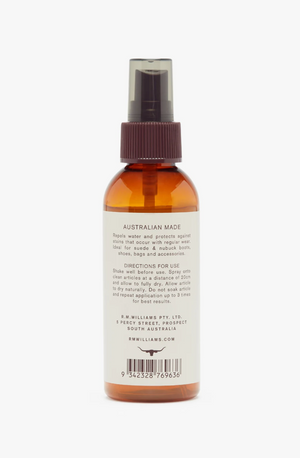 The RM Williams Suede Protector Spray, featuring a spray bottle with a brown cap and clear body, contains a liquid formulated specifically for protecting suede. The label proudly states "AUSTRALIAN MADE" and includes usage directions and company information. This non-abrasive care product is ideal for protecting sueded and nubuck boots.
