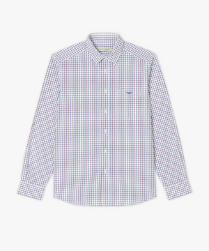 The RM Williams Collins Shirt is a long-sleeved, button-down cotton poplin shirt featuring a small checkered pattern in blue and red on a white background. It comes with a pointed collar and is adorned with a small Longhorn embroidery on the left chest, making it perfect for a smart casual look.