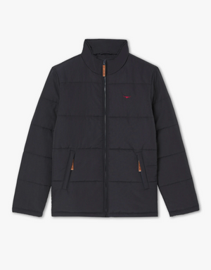 The RM Williams Patterson Creek Jacket is a black, Taslon nylon quilted puffer jacket with a high collar. It features a front zipper and two front diagonal zippered pockets with brown leather accents. The jacket has long sleeves and a small red embroidered logo on the left chest.