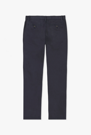 Image of the RM Williams Stirling Chino, a pair of navy blue straight leg pants viewed from the back. Crafted from stretch cotton chino fabric, these pants feature two buttoned back pockets and a small loop above one pocket. The waistband includes belt loops, and the pants are displayed on a white background.