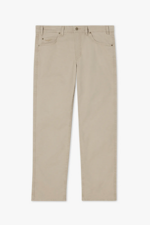 The RM Williams Linesman Cotton Jean is a pair of beige trousers crafted from light stretch cotton twill, featuring a classic five-pocket design. These straight-cut trousers include belt loops and a button closure at the waistband. The front pockets are angled, accompanied by two back pockets, one of which has a small logo.