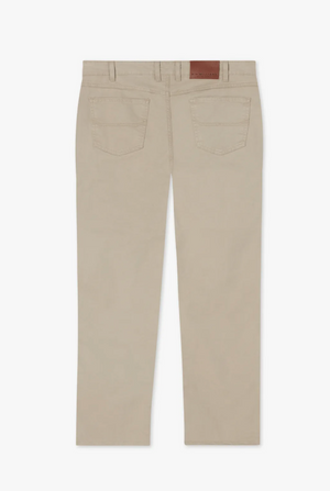 Back view of a pair of RM Williams Linesman Cotton Jeans in beige khaki, featuring two back pockets and belt loops. Crafted from stretch cotton twill, these slim-fit jeans have a leather patch with embossed branding above the right pocket. The fabric composition is either pure cotton or a cotton blend.