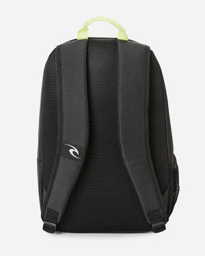 The Rip Curl Evo 24L Tube Heads Backpack has a black design with padded shoulder straps, a mesh back panel, and a light green top handle. It features side pockets, a sleek laptop section, and an added touch of style with a small logo on one strap.