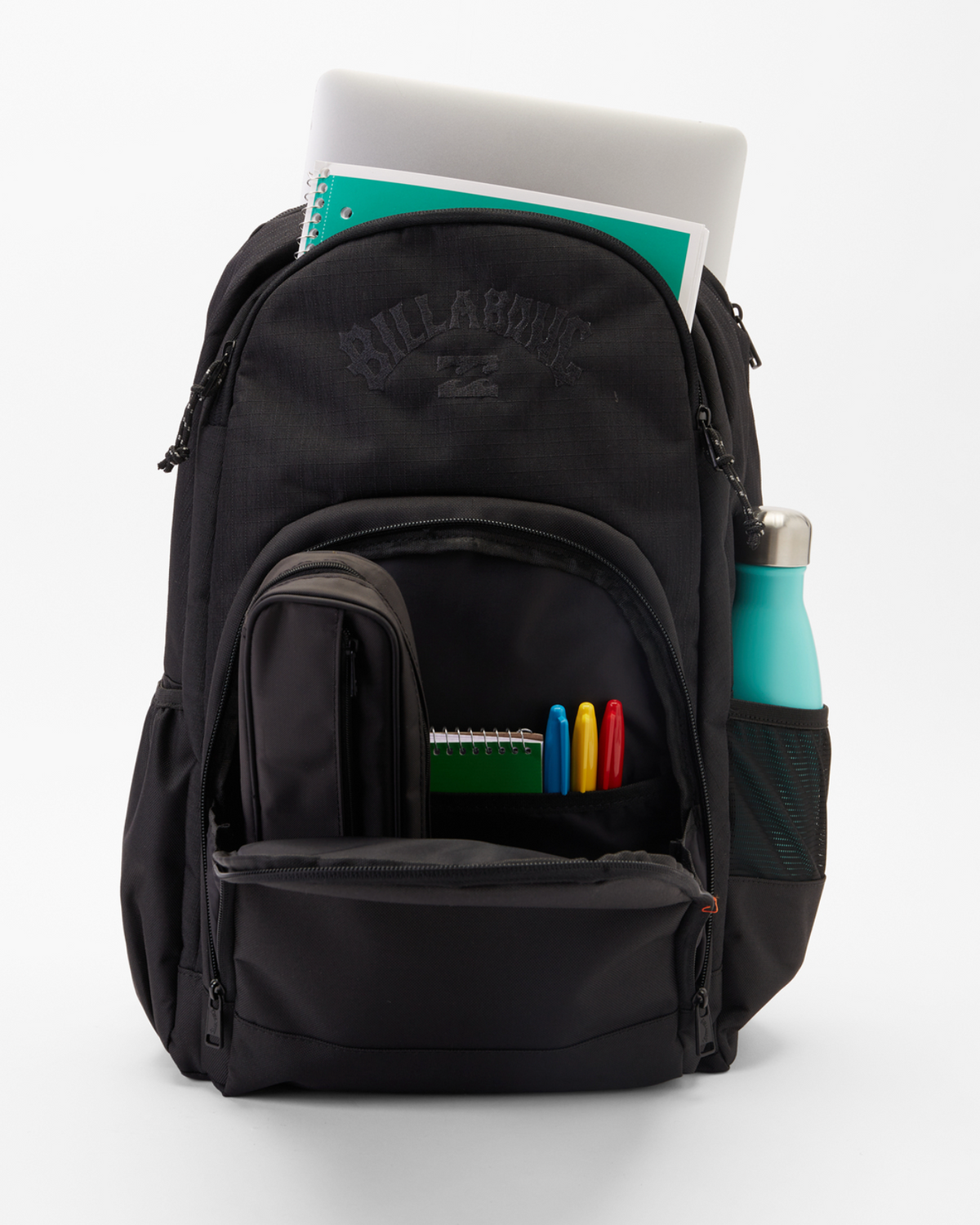 The Billabong Command Backpack, in sleek black recycled polyester, features multiple compartments to hold a laptop, notebooks, a small bag, and colored pens. A teal water bottle fits in its side pocket. It stands upright against a white backdrop, highlighting its stylish laptop compartment.