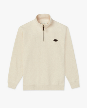 The RM Williams Mulyungarie Fleece is a beige quarter-zip sweater made from brushed cotton, featuring a high collar and a small black oval logo on the left chest. It includes ribbed cuffs and hem with a partially open zip, exuding vintage style charm.