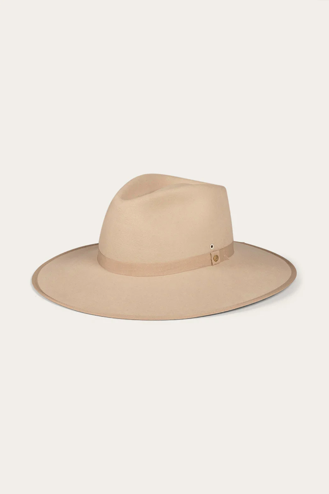 The Ringers Western Woodford Hat features a wide-brimmed design in beige, crafted from premium felt with a brown grosgrain ribbon encircling the crown, all displayed on a white background.