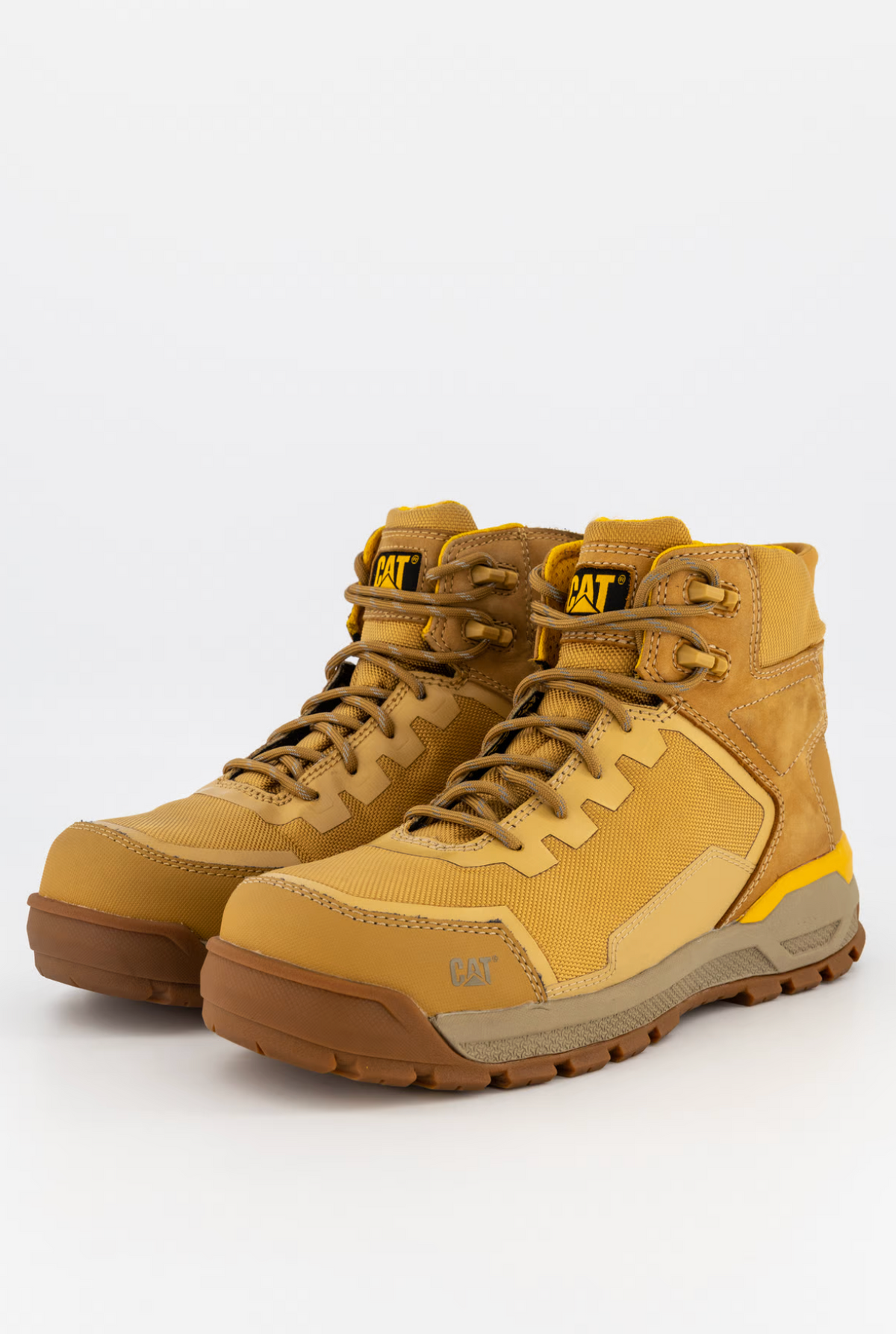 The CAT Propulsion CT Zip Work Boot is a sturdy tan hiking boot featuring rugged, slip-resistant dark brown soles and high ankle support. It has a lace-up design, composite toe, and visible brand logos on the tongue and side to ensure comfort in every step.